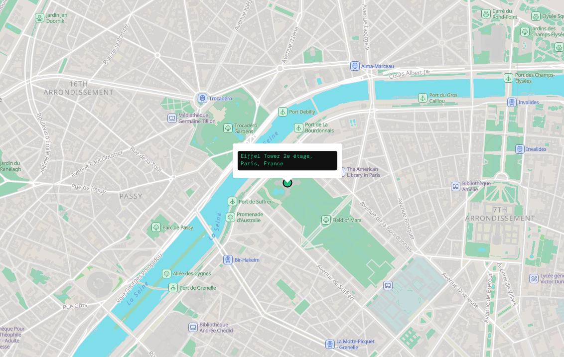 Reverse geocode demo showing pin on map with address label